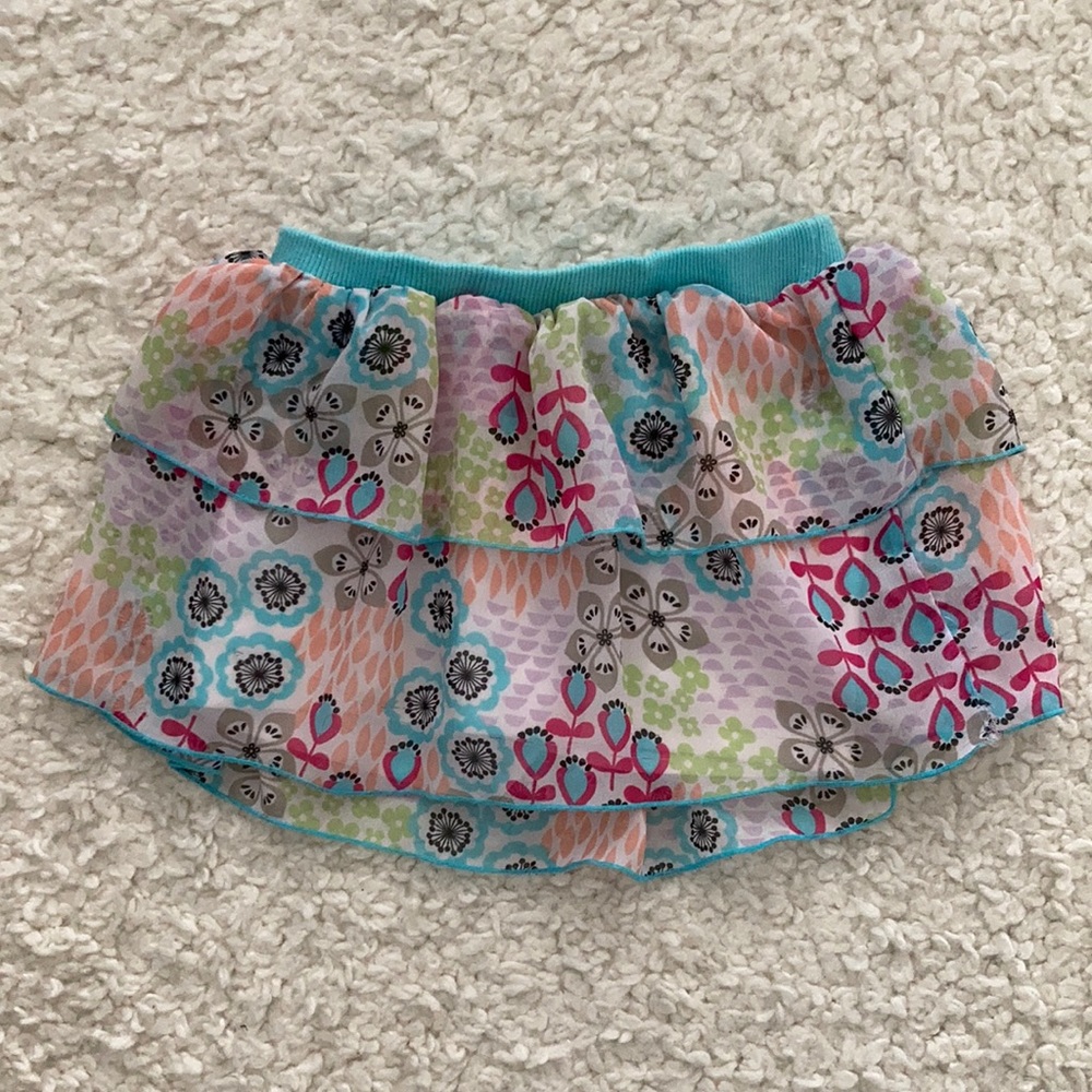Baby skirt with ruffles and floral print